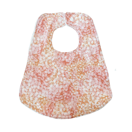 Load image into Gallery viewer, Audrey&amp;#39;s Moon - Cotton Angled Front Bib (Sunset Hydrangea)
