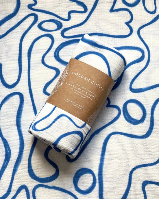Load image into Gallery viewer, Golden Child - The Laze 100% Organic Cotton Swaddle (Electric)
