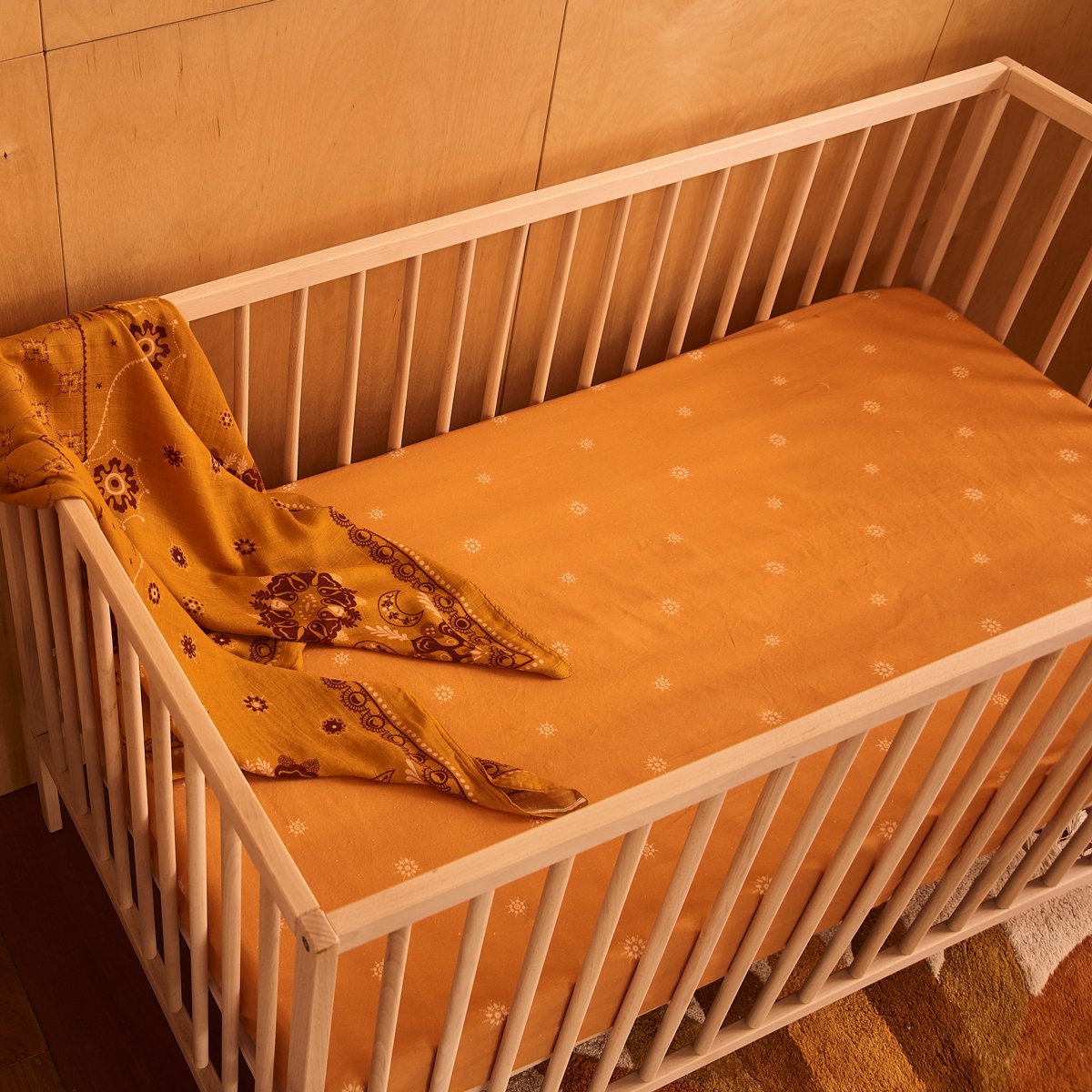 Load image into Gallery viewer, Banabae - Celestial Sunshine Fitted Cot Sheet
